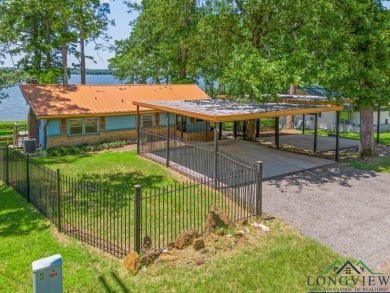 Lakefront Retreat on Prestigious Lake O' The Pines  Escape to - Lake Home For Sale in Avinger, Texas