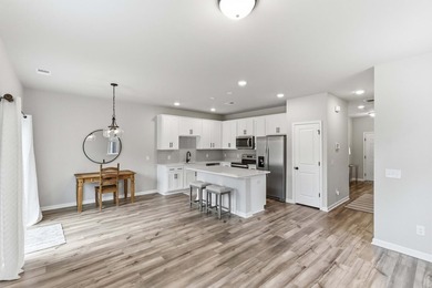 TRULY TURN-KEY! This 2023 end-unit townhome by Ashton Woods is - photo 15