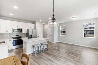 TRULY TURN-KEY! This 2023 end-unit townhome by Ashton Woods is - photo 16