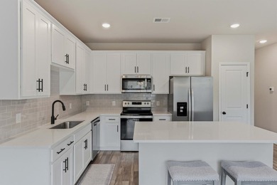 TRULY TURN-KEY! This 2023 end-unit townhome by Ashton Woods is - photo 17