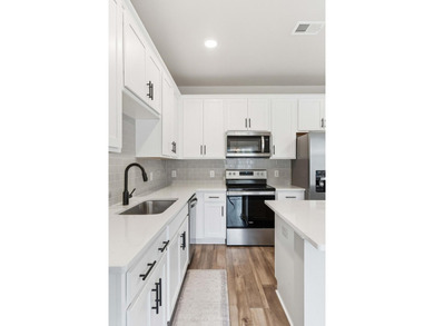 TRULY TURN-KEY! This 2023 end-unit townhome by Ashton Woods is - photo 19
