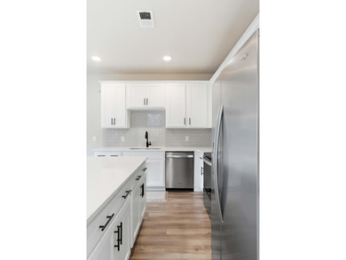 TRULY TURN-KEY! This 2023 end-unit townhome by Ashton Woods is - photo 20