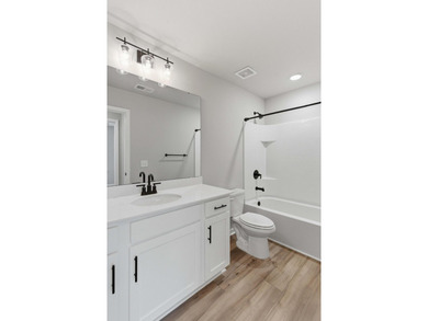 TRULY TURN-KEY! This 2023 end-unit townhome by Ashton Woods is - photo 46
