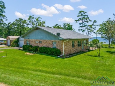 Lakefront Cottage on Prestigious Lake O' The Pines - East Texas - Lake Home For Sale in Avinger, Texas