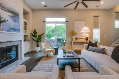 Step into a bold, 4-level townhome that seamlessly marries the