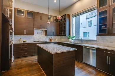 Step into a bold, 4-level townhome that seamlessly marries the