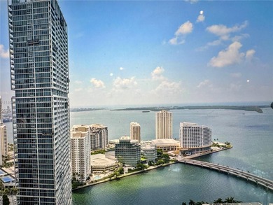 Stunning 1-Bedroom Condo with City & Water Views in the Heart of