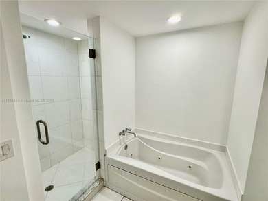 Stunning 1-Bedroom Condo with City & Water Views in the Heart of