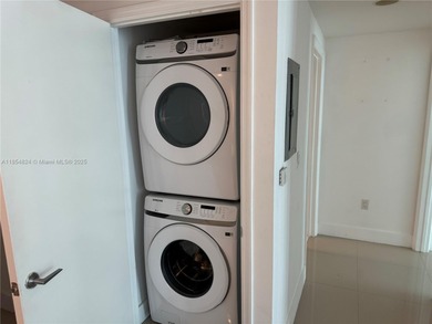 Stunning 1-Bedroom Condo with City & Water Views in the Heart of