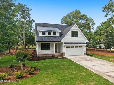 The Coquina by Elan Homes features a spacious and inviting - photo 3