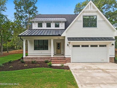 The Coquina by Elan Homes features a spacious and inviting - photo 4