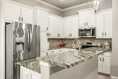 This beautifully designed 3 bedroom, 2 bathroom home with an - photo 8