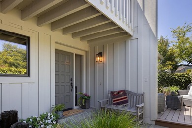 This exquisitely updated townhome enjoys privacy, sunshine, and - photo 3