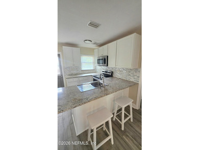 Affordable Florida living at its best! This mint-condition - photo 6