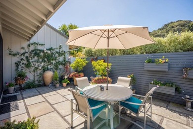 This exquisitely updated townhome enjoys privacy, sunshine, and - photo 9