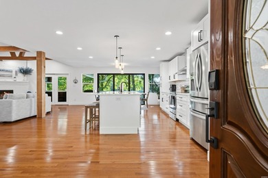 Tucked away on a large 1-acre waterfront lot, this fully - photo 11