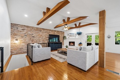 Tucked away on a large 1-acre waterfront lot, this fully - photo 13