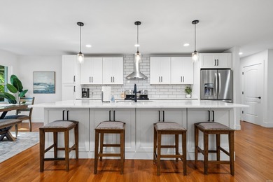 Tucked away on a large 1-acre waterfront lot, this fully - photo 18