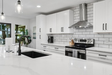 Tucked away on a large 1-acre waterfront lot, this fully - photo 19