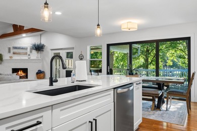 Tucked away on a large 1-acre waterfront lot, this fully - photo 21