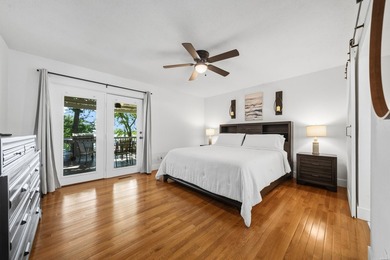 Tucked away on a large 1-acre waterfront lot, this fully - photo 24