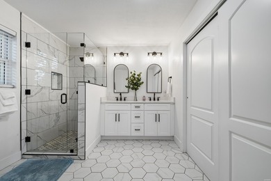 Tucked away on a large 1-acre waterfront lot, this fully - photo 26