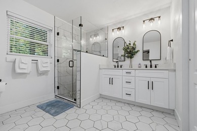 Tucked away on a large 1-acre waterfront lot, this fully - photo 27