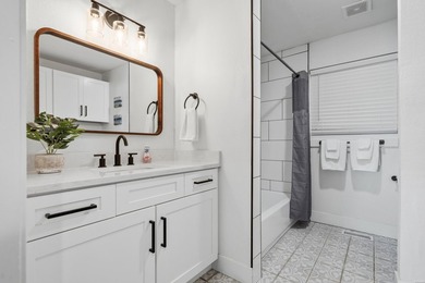 Tucked away on a large 1-acre waterfront lot, this fully - photo 31