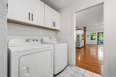 Tucked away on a large 1-acre waterfront lot, this fully - photo 33