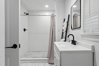 Tucked away on a large 1-acre waterfront lot, this fully - photo 39