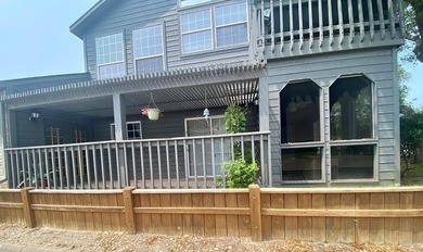 Spacious ground-floor 2-bedroom, 2.5-bath corner unit with a - photo 1