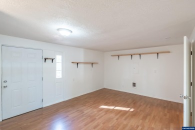 This property hosts both a main home & a studio with alley