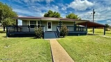 Commercial property encompassing roughly 1 acre, which includes