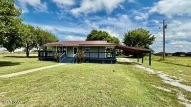 Commercial property encompassing roughly 1 acre, which includes