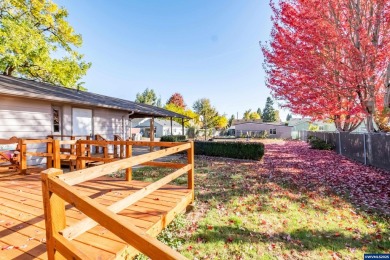 This property hosts both a main home & a studio with alley