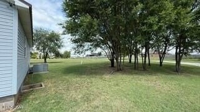 Commercial property encompassing roughly 1 acre, which includes