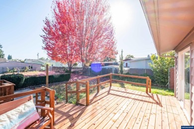 This property hosts both a main home & a studio with alley