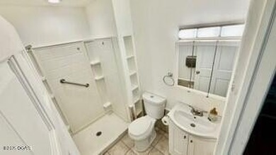 Commercial property encompassing roughly 1 acre, which includes