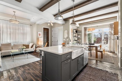 Experience refined city living at 315 N Howes St, where modern - photo 1
