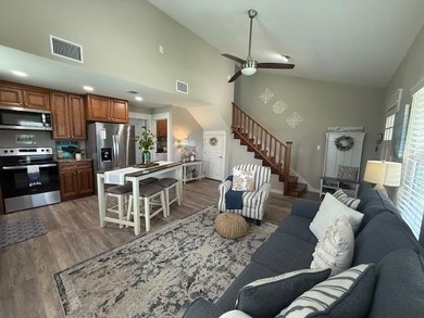 Nestled in the waterfront community of Holiday Beach, this - photo 1