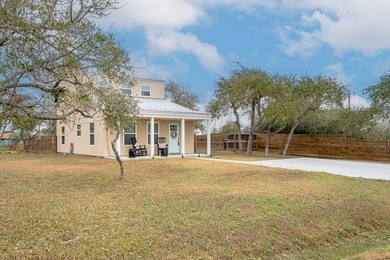 Nestled in the waterfront community of Holiday Beach, this - photo 7