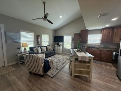 Nestled in the waterfront community of Holiday Beach, this - photo 10