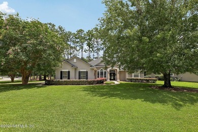 WOW - Nestled on a beautifully landscaped, nearly half-acre lot - photo 4