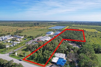 This prime 7-acre lot is located in the heart of a rapidly - photo 1