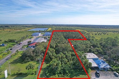 This prime 7-acre lot is located in the heart of a rapidly - photo 4