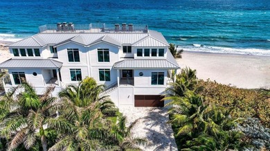 Welcome to this stunning 3-story townhouse in Ocean Ridge. This - photo 1