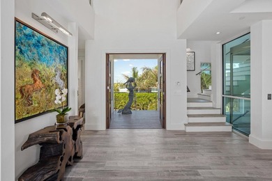 Welcome to this stunning 3-story townhouse in Ocean Ridge. This - photo 6