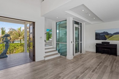 Welcome to this stunning 3-story townhouse in Ocean Ridge. This - photo 7
