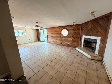 Opportunity awaits! This 1,644-square-foot concrete block home - photo 3