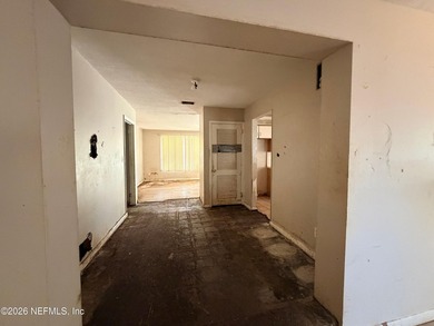 Opportunity awaits! This 1,644-square-foot concrete block home - photo 4